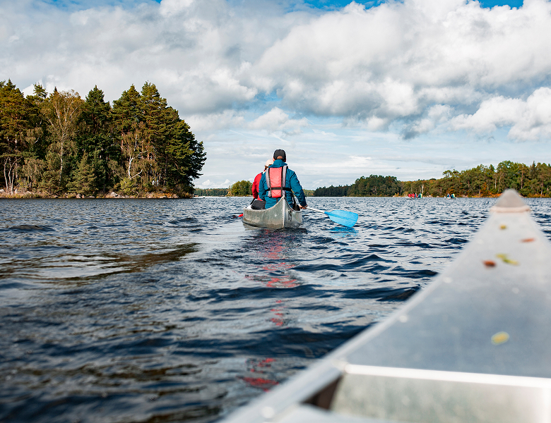 Man in a canoe on the Rideau Lake